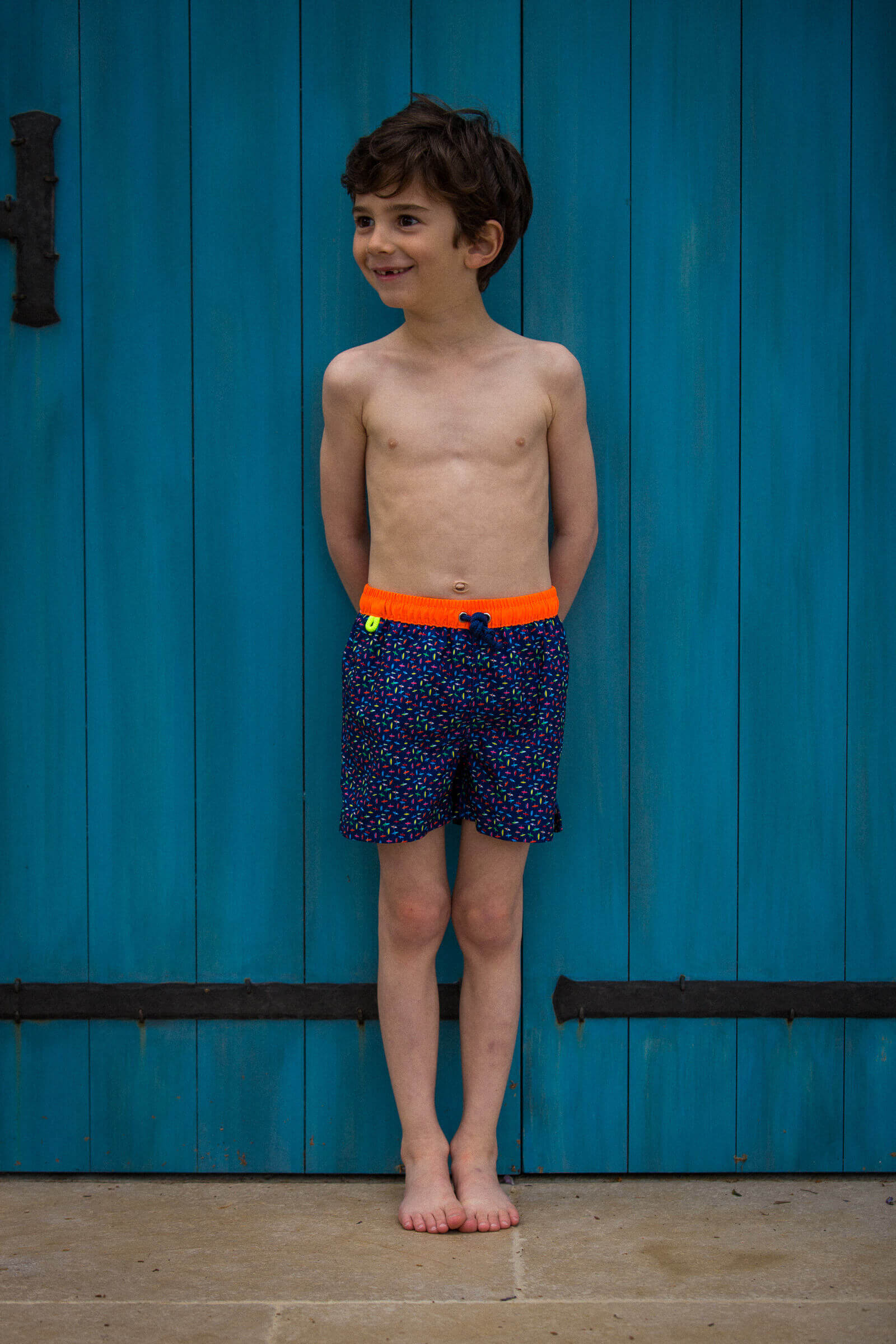 Boy wearing a swimsuit with elasticated belt Meno Bondi Beach