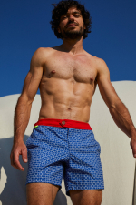 Man wearing a swimsuit with buttoned belt Air Navy Kangaroos