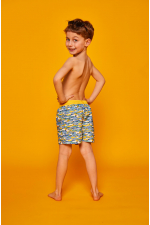 Boy wearing a swimsuit with buttoned belt Meno Camouflage GILI'S x BENSIMON