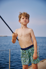 Boy wearing a swimsuit with buttoned belt Meno Tropical Leopard