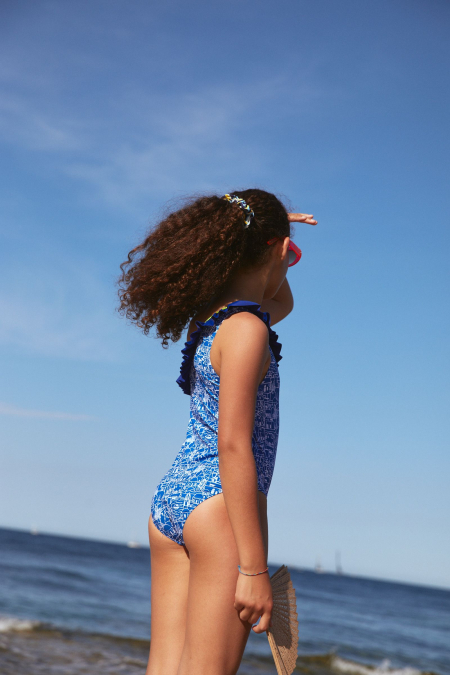 Girl wearing a one-piece swimsuit Folegandros