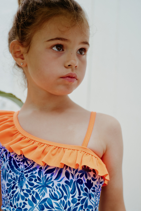 Girl wearing a one-piece swimsuit Amazonico